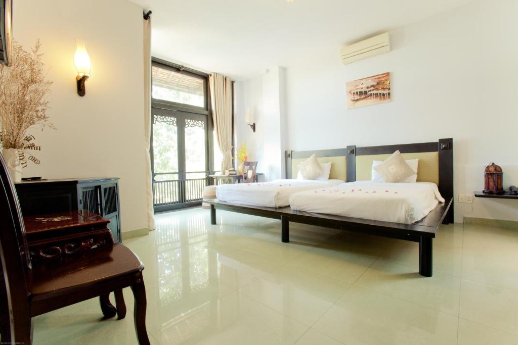 Faifoo Boutique Hotel Хошимин Номер фото